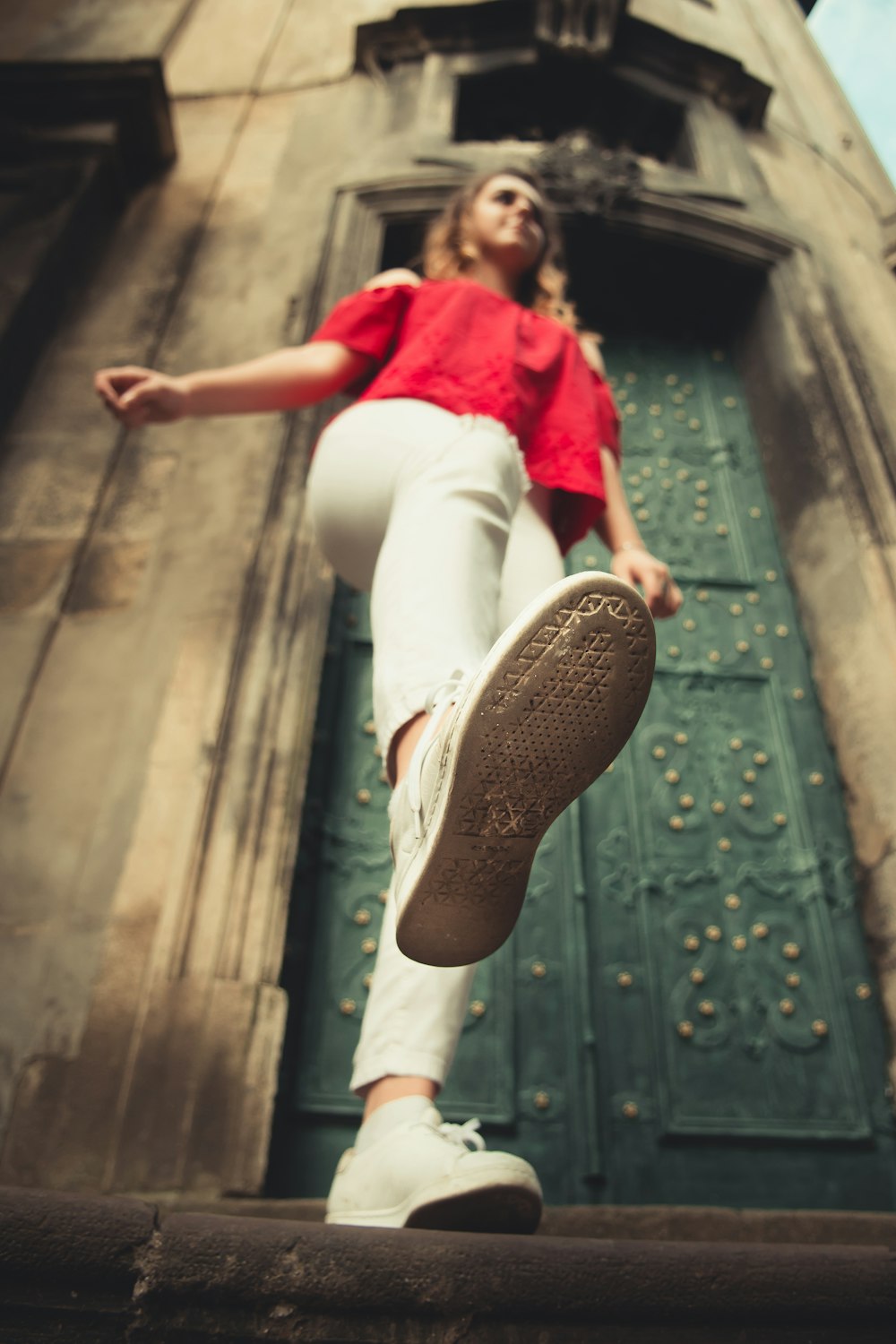 woman near green door