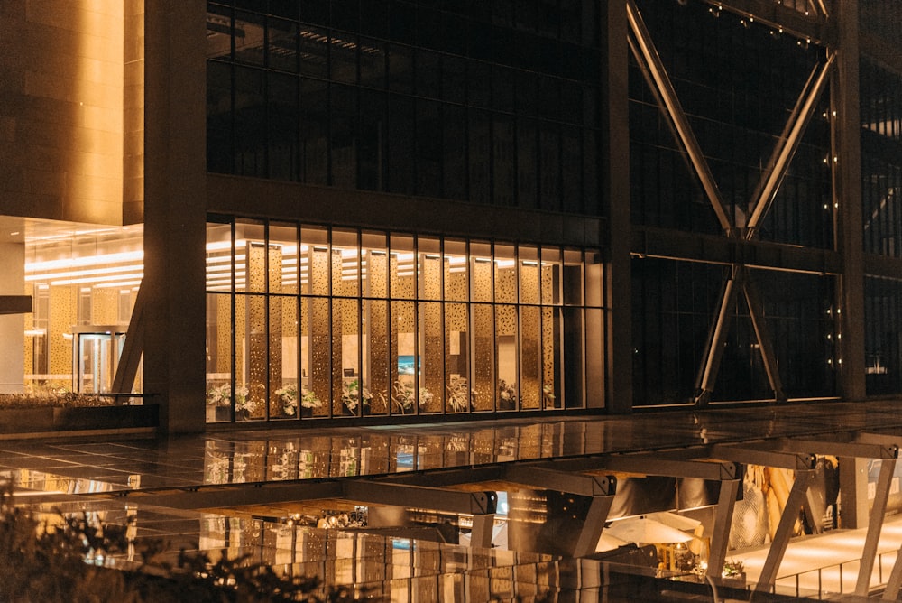 a large building with a lot of windows at night