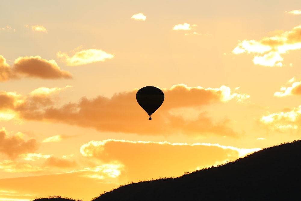 silhouette of hot air baloon