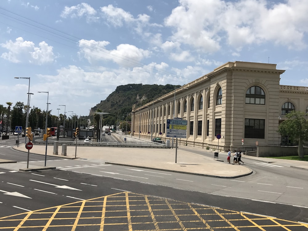 a large building sitting on the side of a road