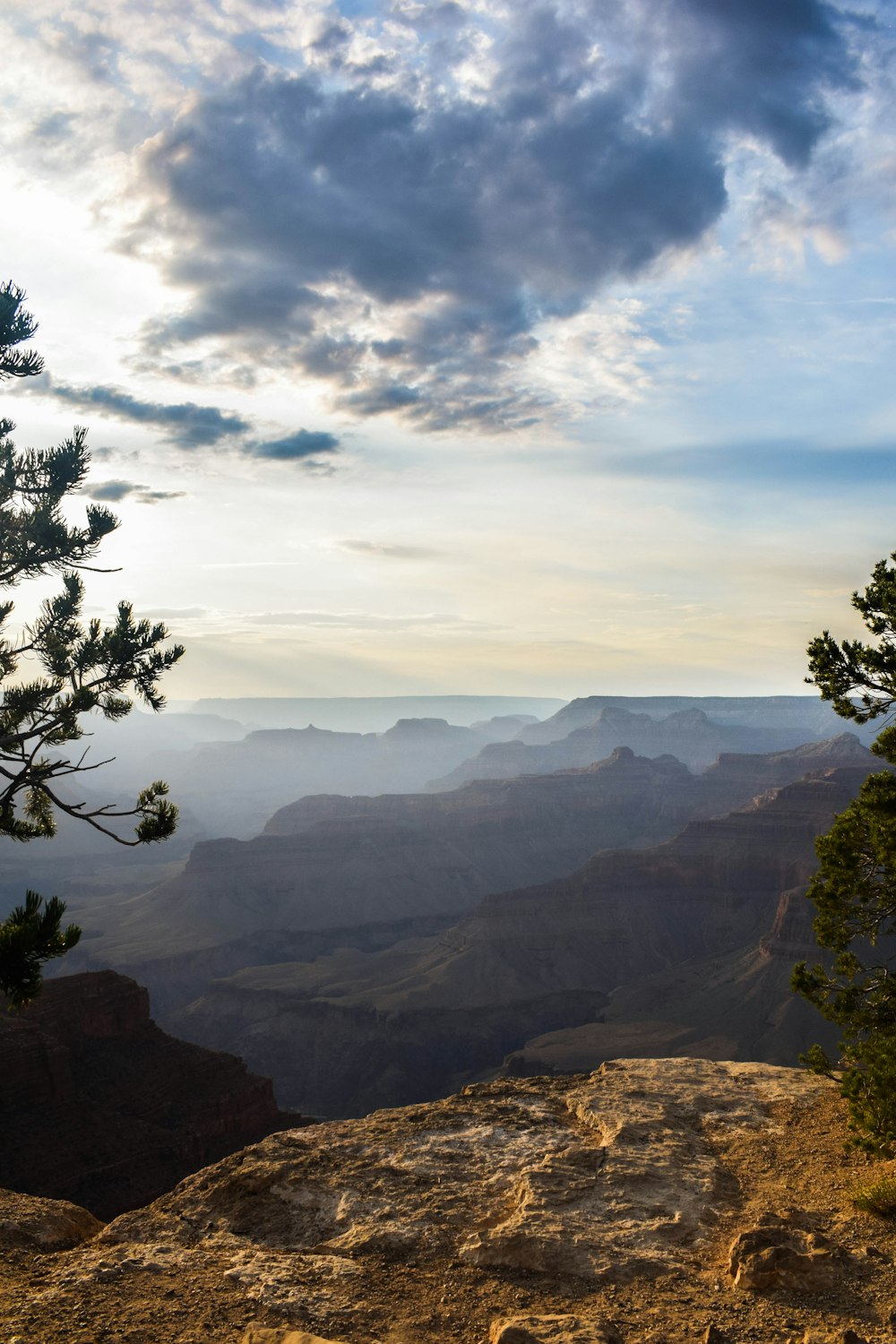 rock cliff overlooking mountains