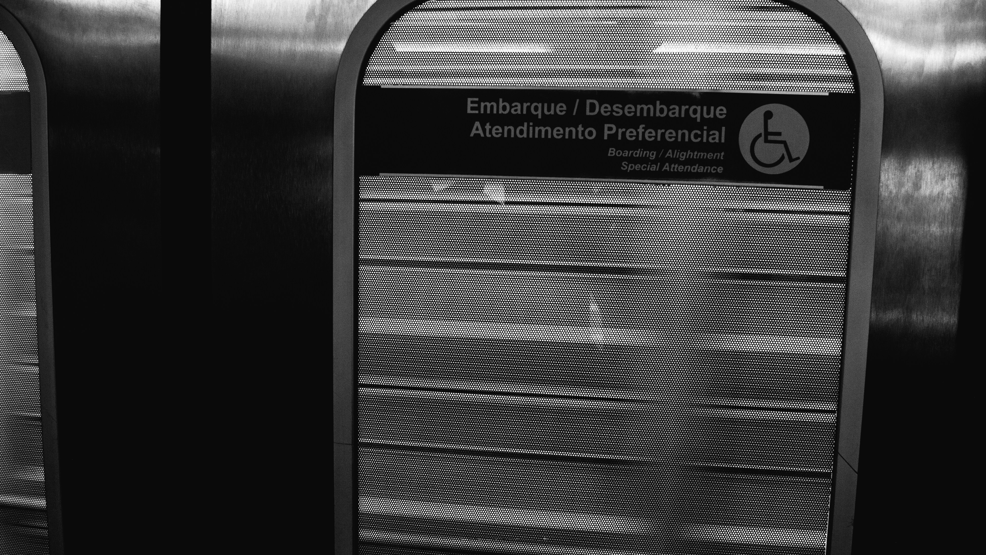 a black and white photo of a subway