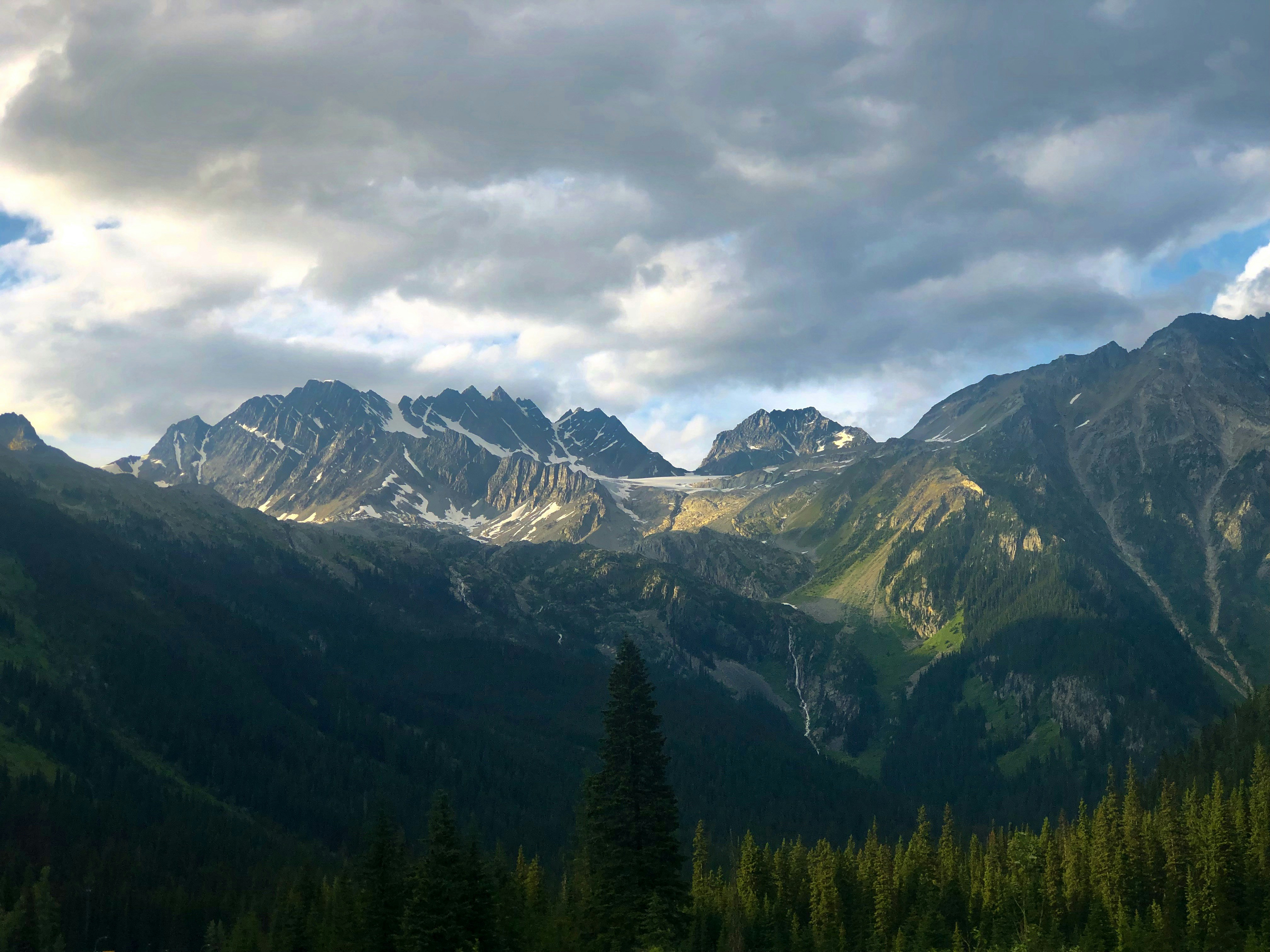 mountain range under nimbus cloud s, 
