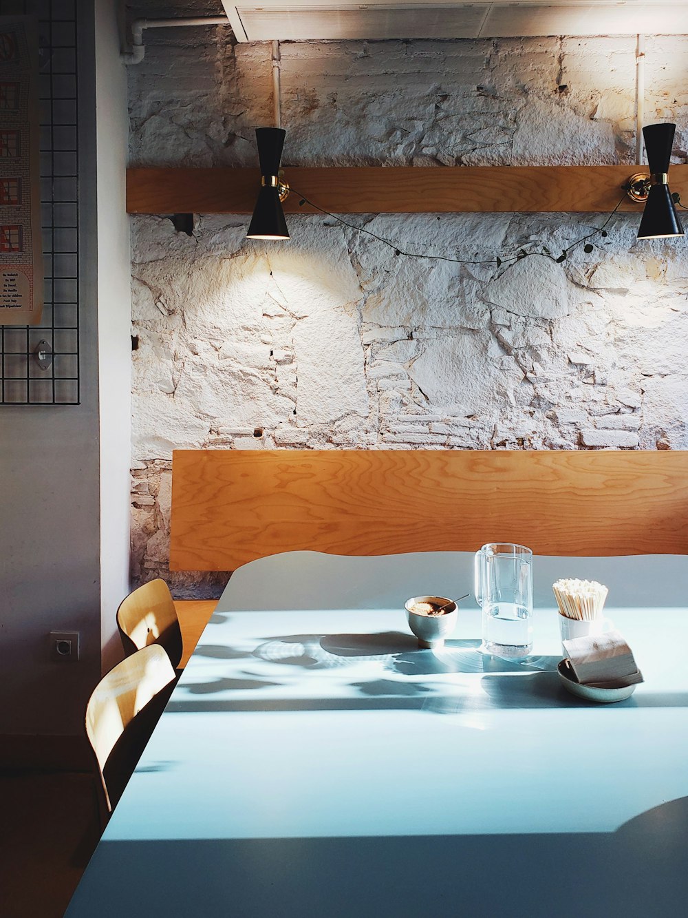 a table with a white table cloth and a blue table cloth