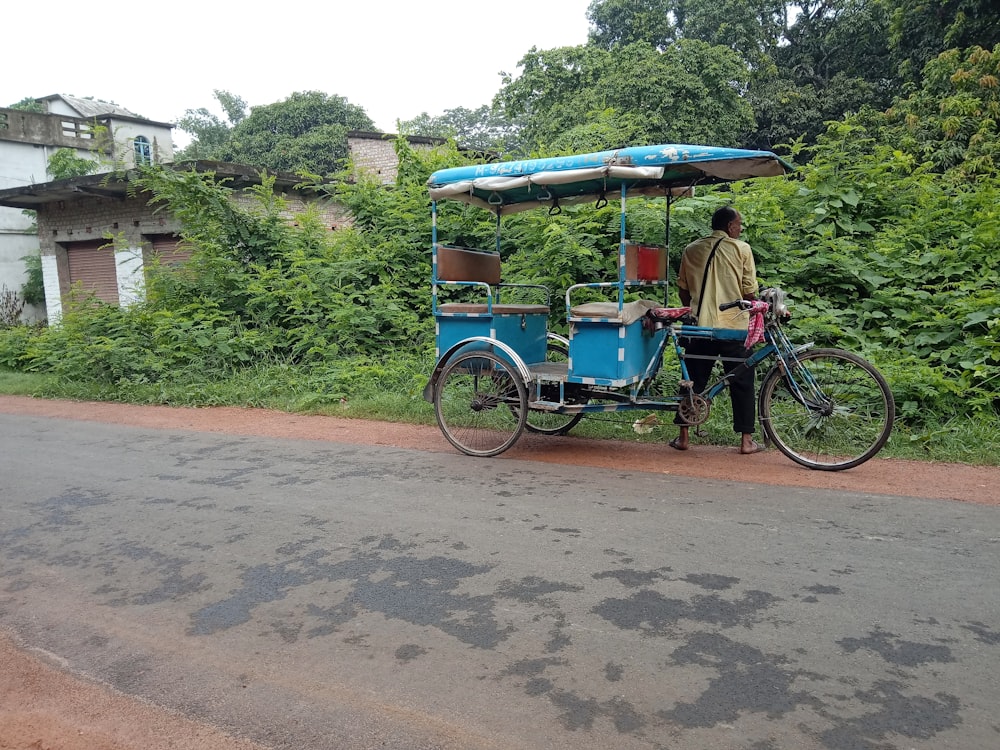 man sitting on trike