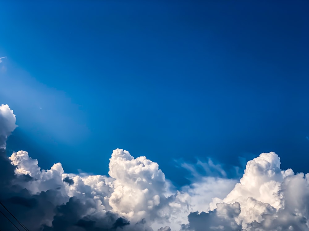 white clouds under blue sky