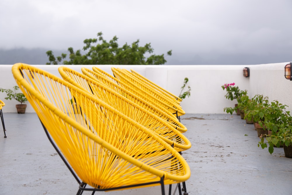 yellow chair close-up photography