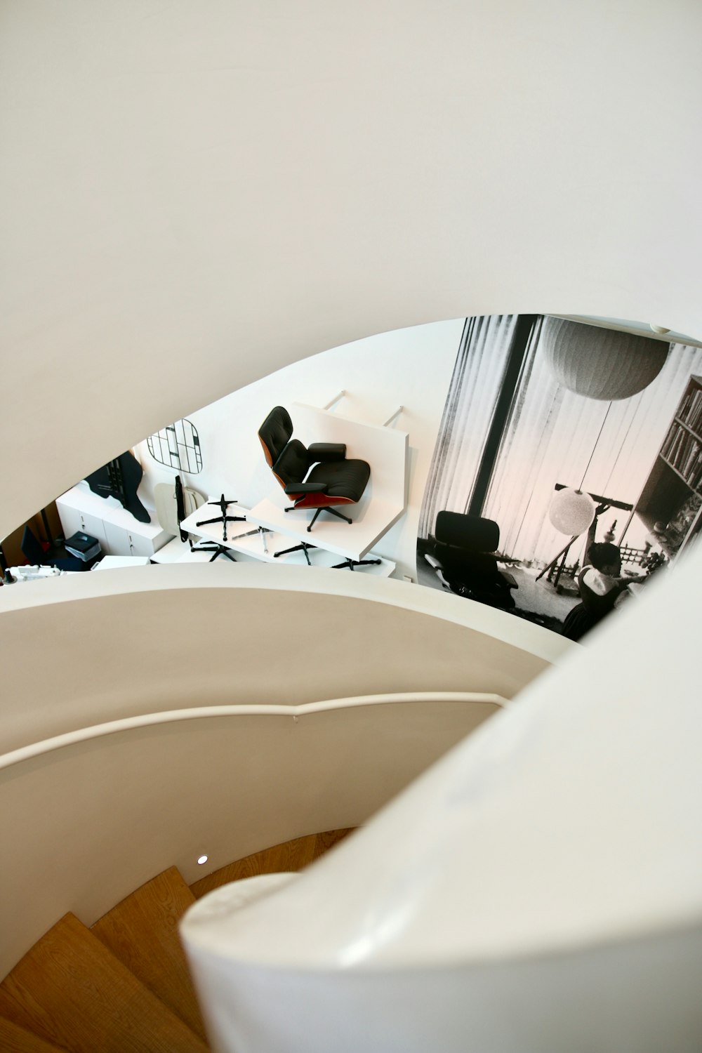 view of spiral stairs inside office