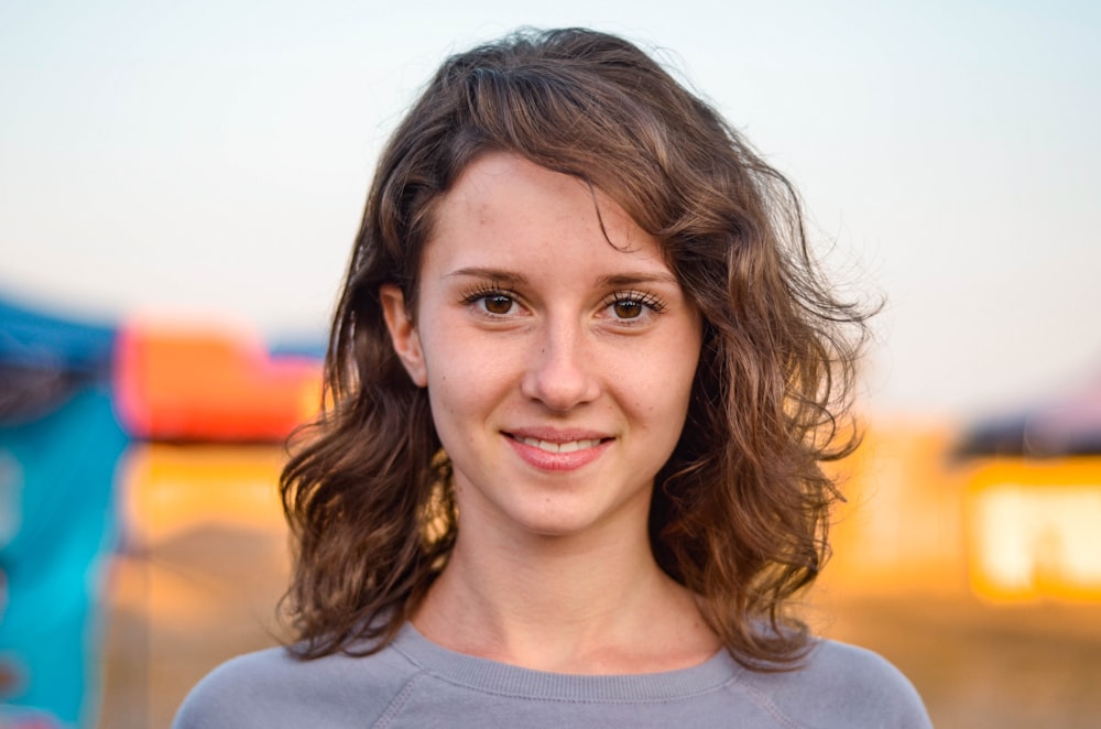 women smiling close-up photography