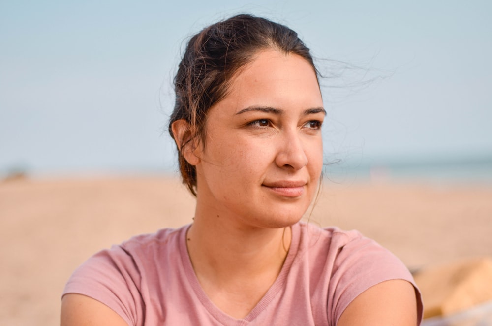 woman wearing brown shirt