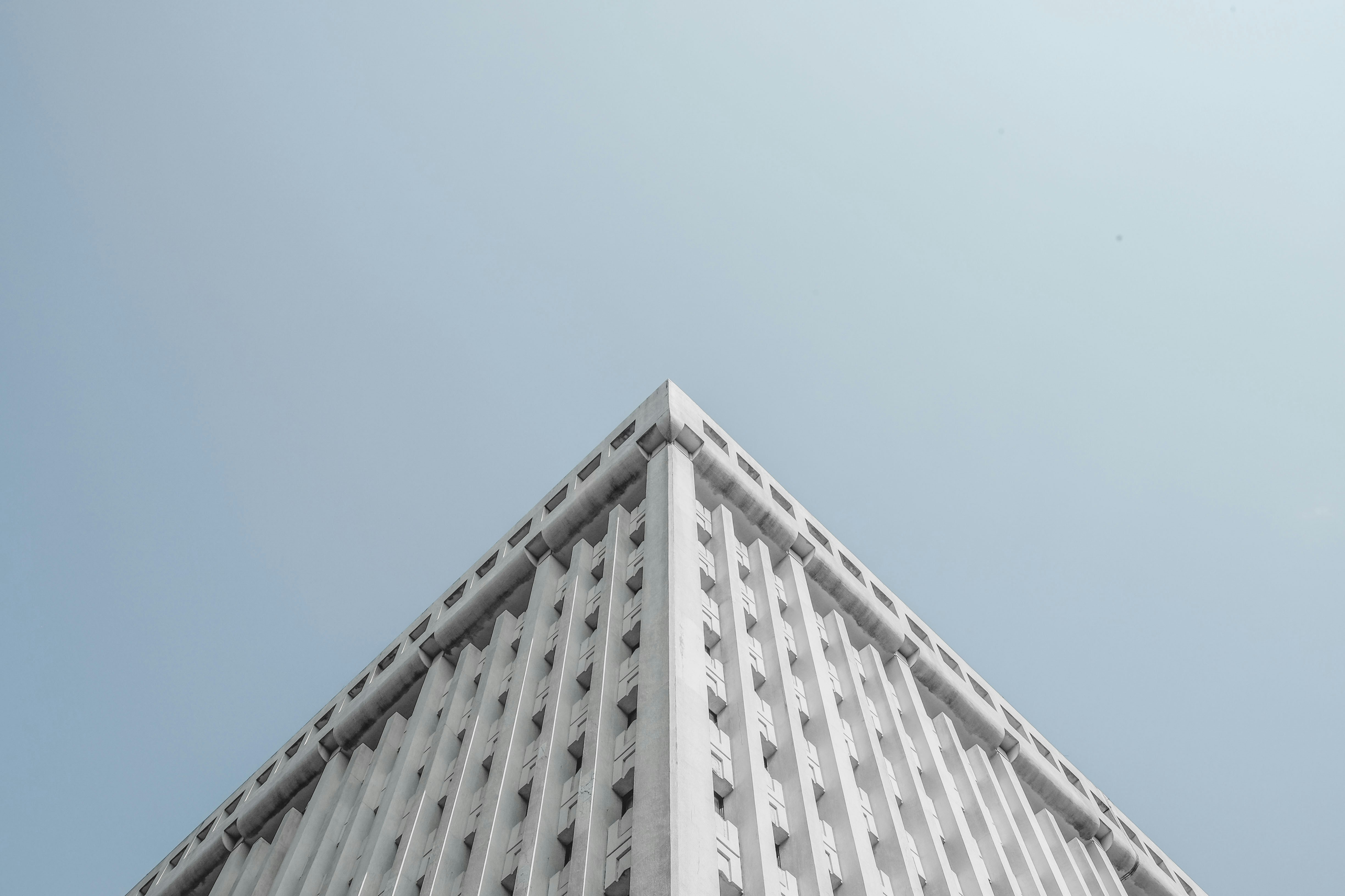 white concrete building close-up photography, 