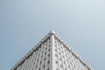 white concrete building close-up photography