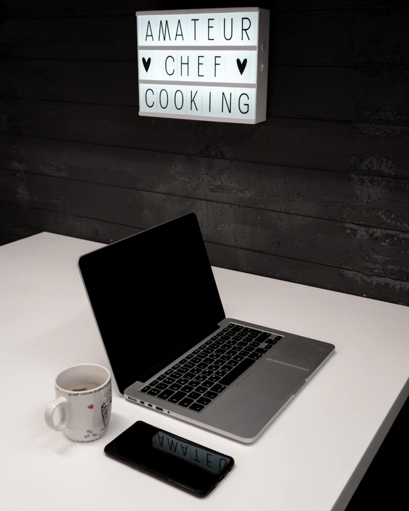 Financial planning with a smartphone and laptop