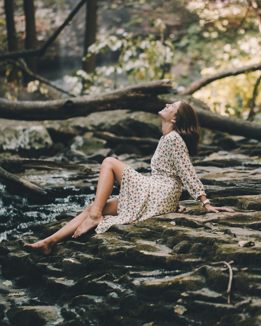 women sitting near trees during daytime