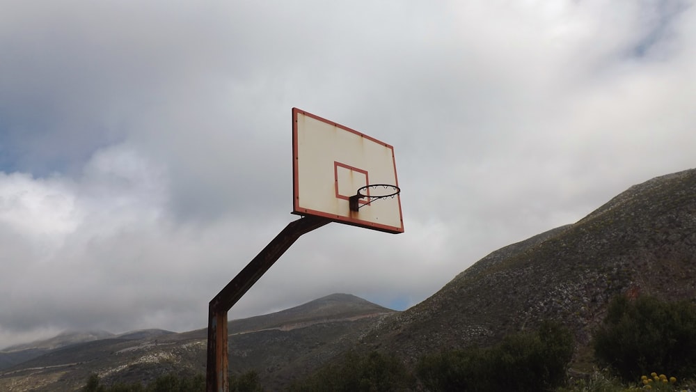 white and orange basketball hoop close-up photography