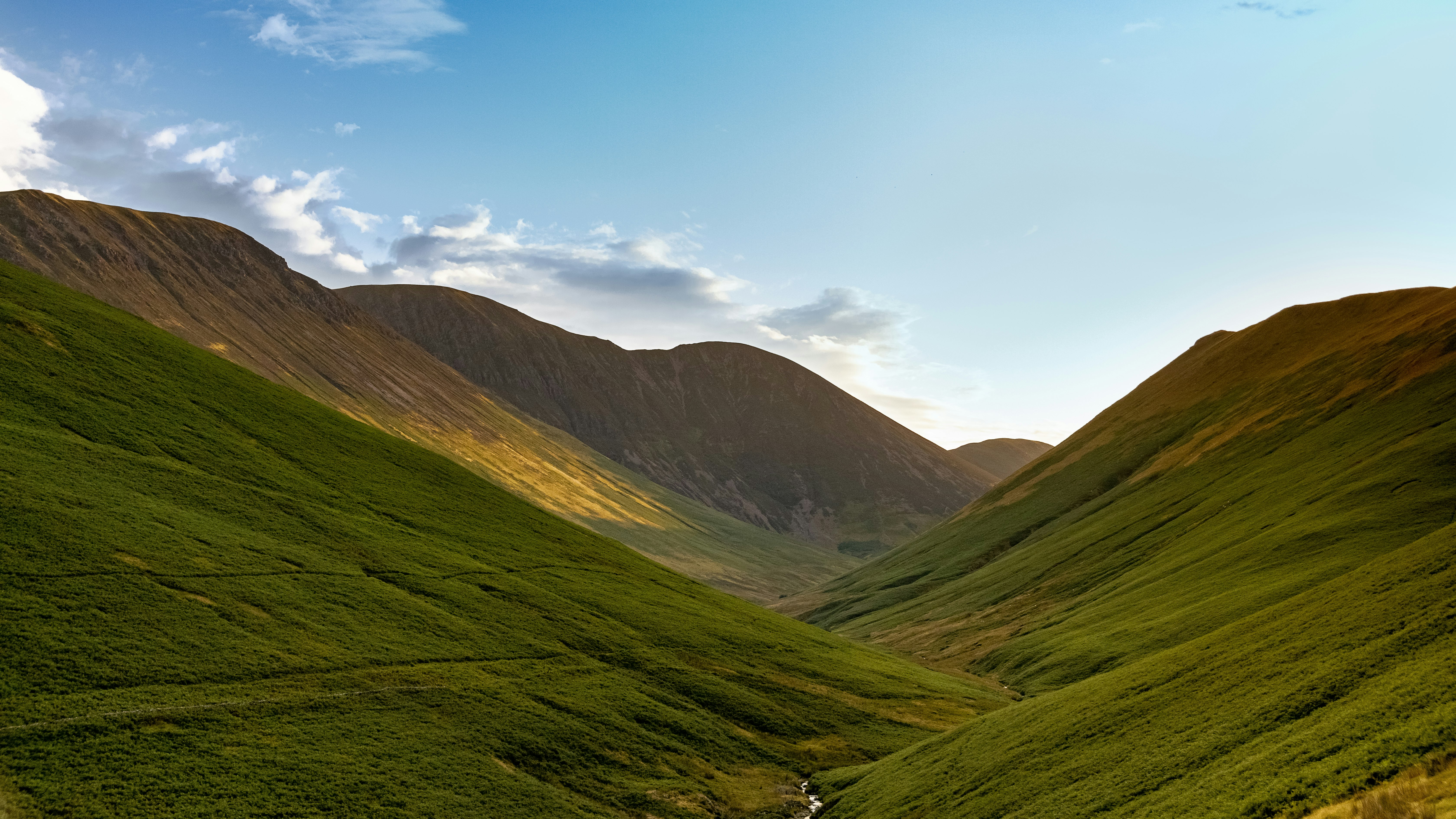 mountain range under clear blue sky