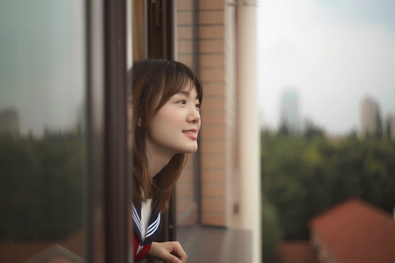 A woman relaxing at home, calm and ready to listen