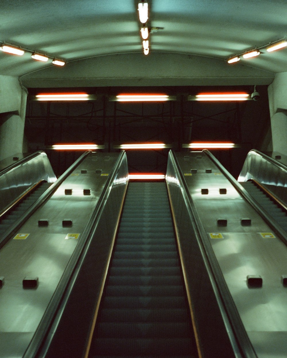empty gray and black escalator