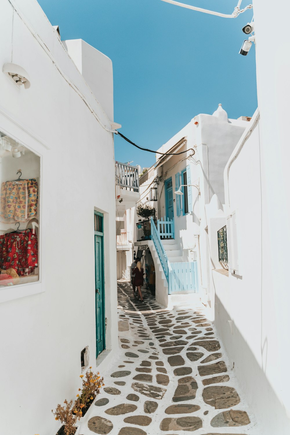 empty alley between white houses