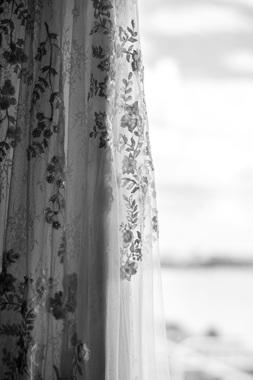white and grey floral sheer curtain