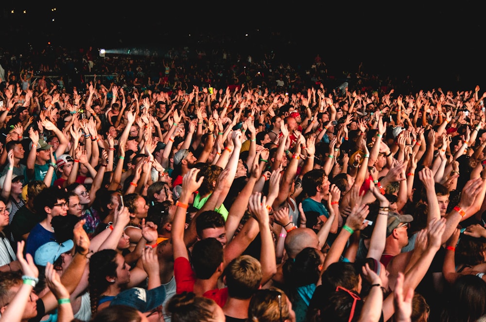 photography of people gathering near outdoor during nighttime