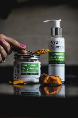 turmeric scrub jar and face wash pump bottle