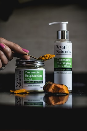 turmeric scrub jar and face wash pump bottle