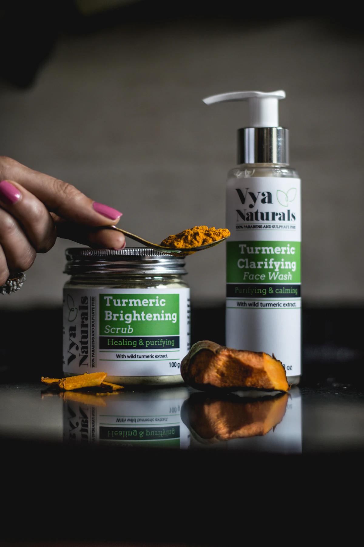 Exfoliant product photography — Exfoliating scrub jar and face wash bottle