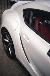 An interior shot of a sleek car showcasing its design.