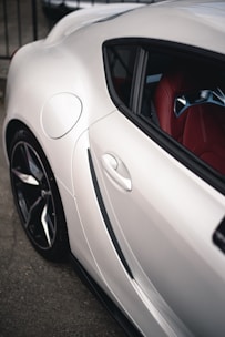 An interior shot of a sleek car showcasing its design.