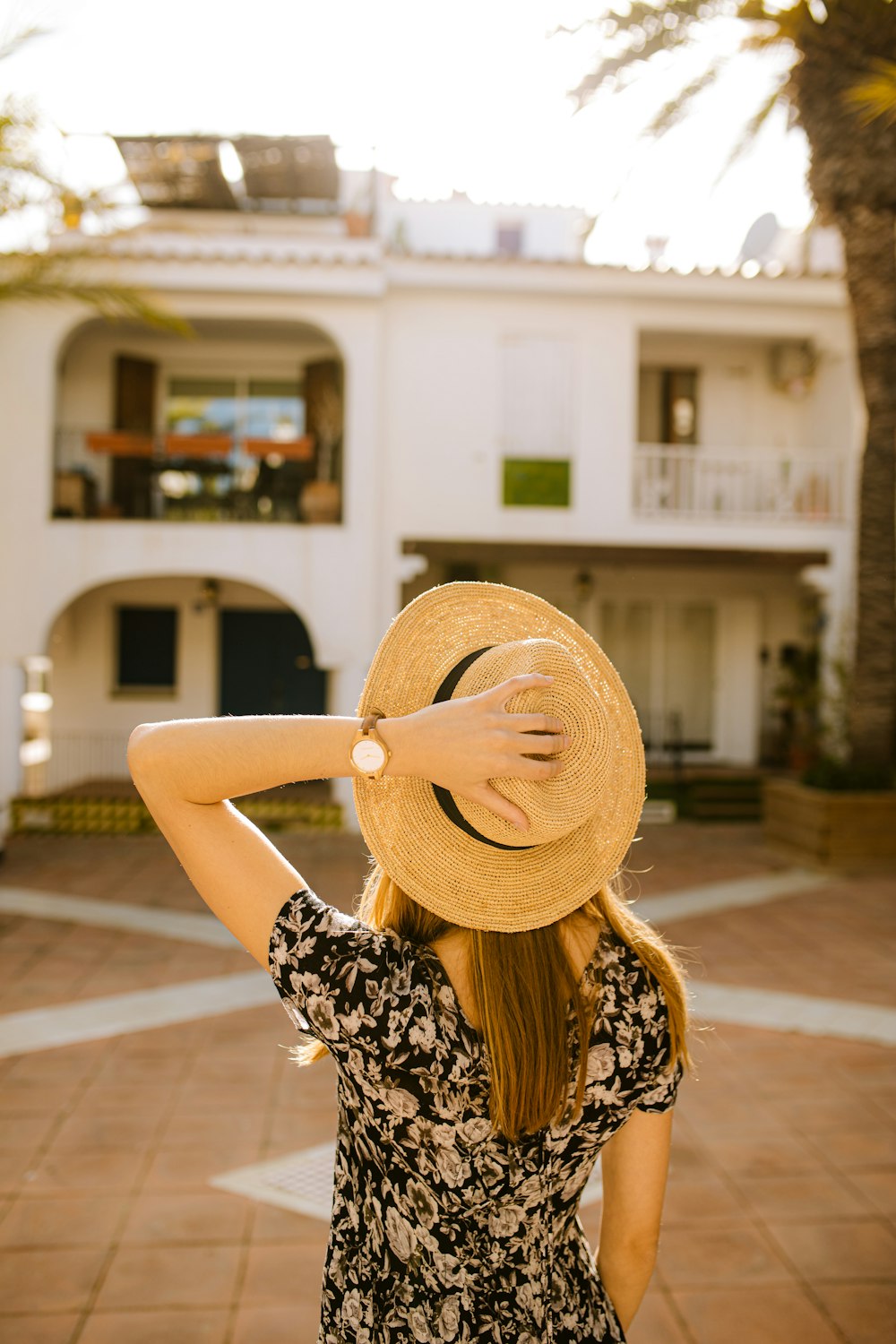 woman wearing brown sun hat during daytime