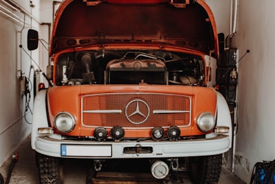 orange Mercedes-Benz truck