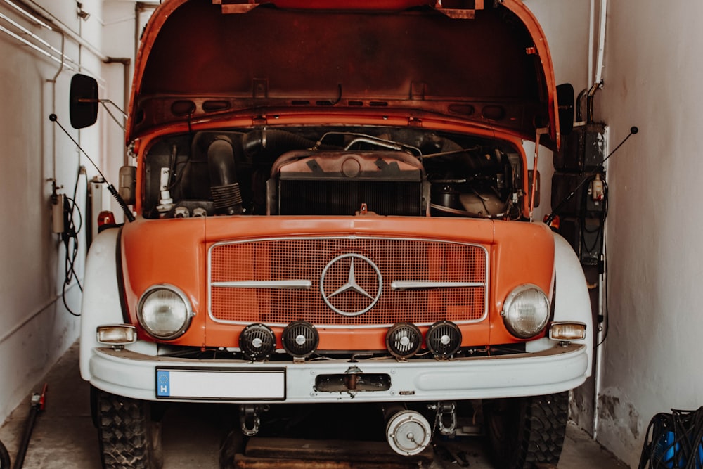 orange Mercedes-Benz truck