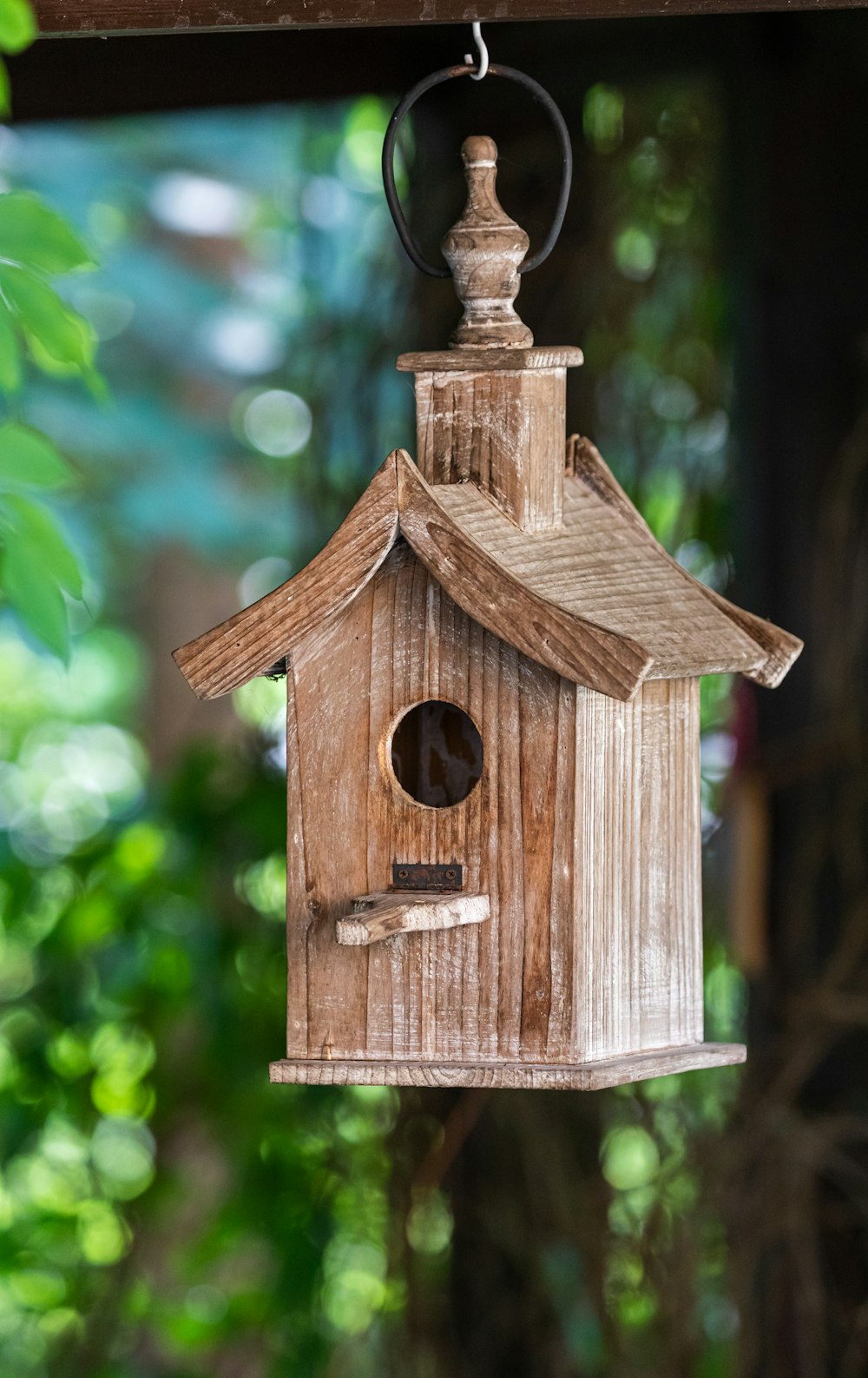 brown wooden birdhouse