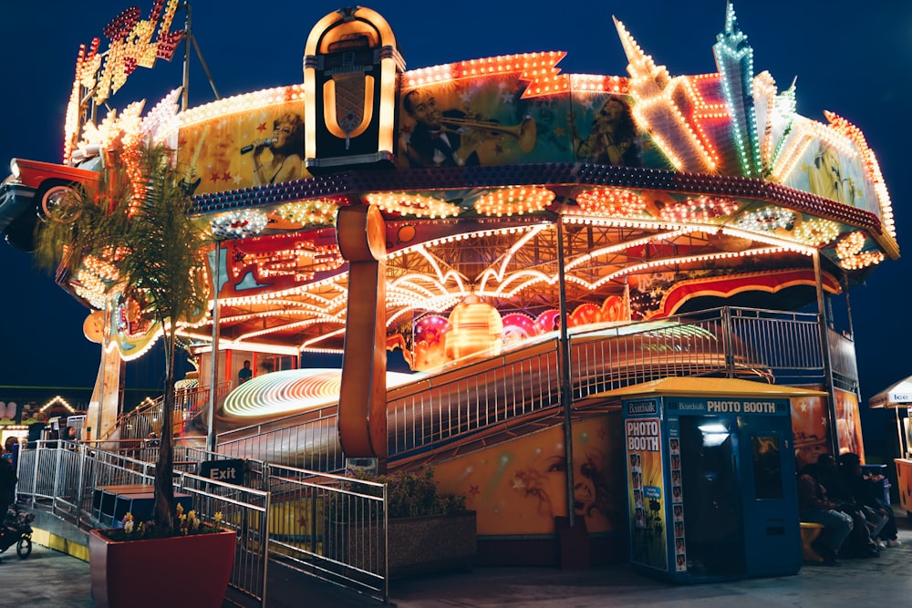 time lapse photo of white and orange carousel