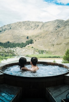 couple in hot tub at daytime
