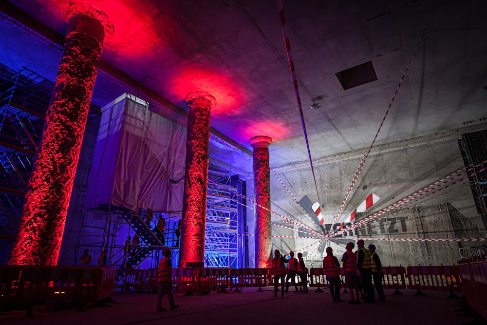 people standing inside well-lit room