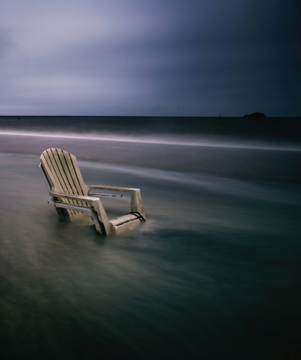 brown wooden adirondack chair