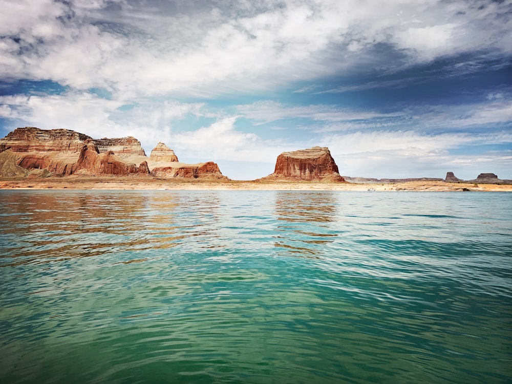 mountains near body of water during daytime