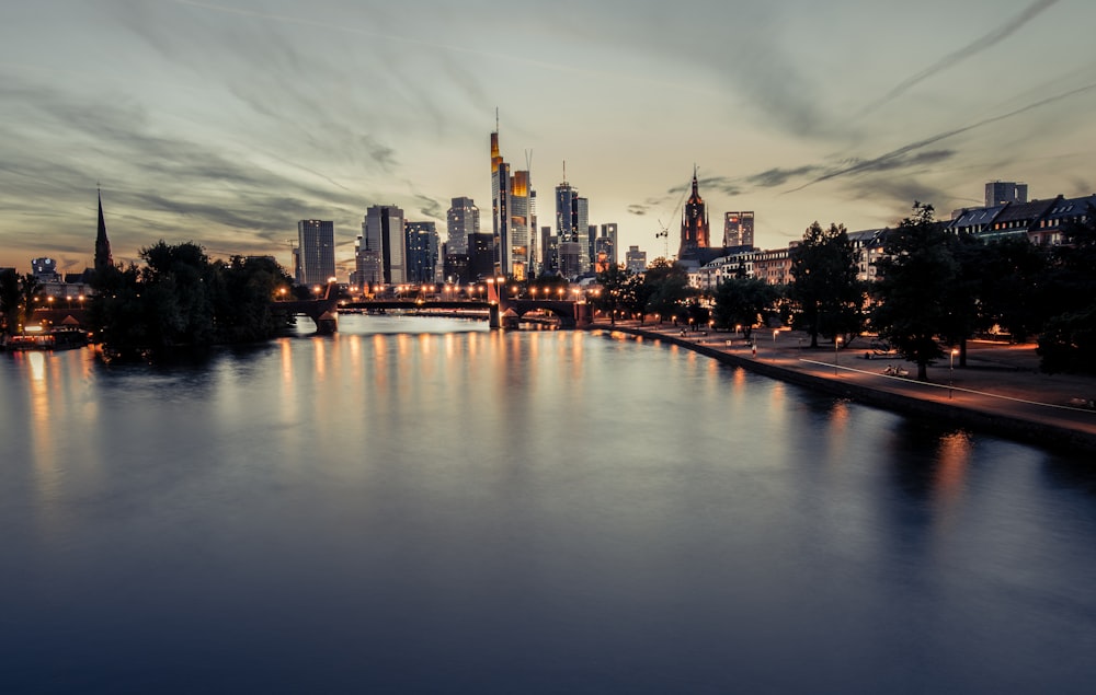 city skyline under white clouds