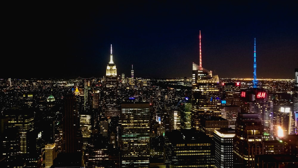 city with high-rise buildings during night time