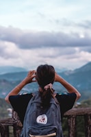 person carrying backpack