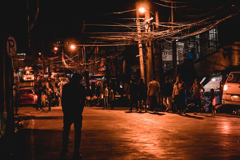 silhouette of people walking in street