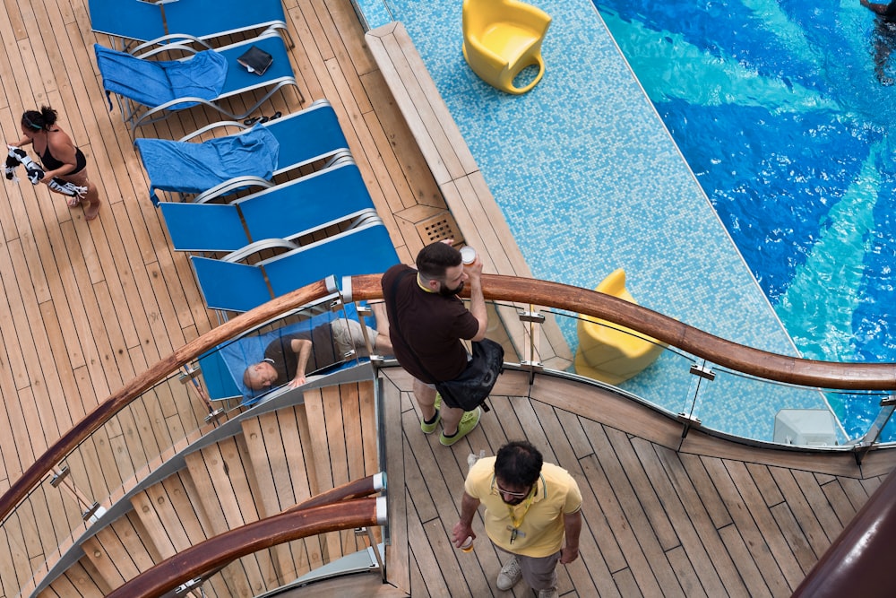 person taking photo of swimming pool