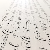 An elegant name correction chart with gold lettering on a deep green background.