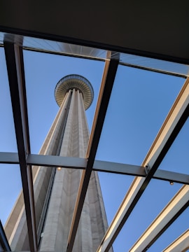 Close-up of a triangle tower with clear blue sky.