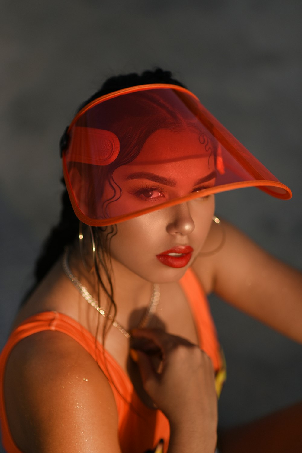 woman wearing orange hat
