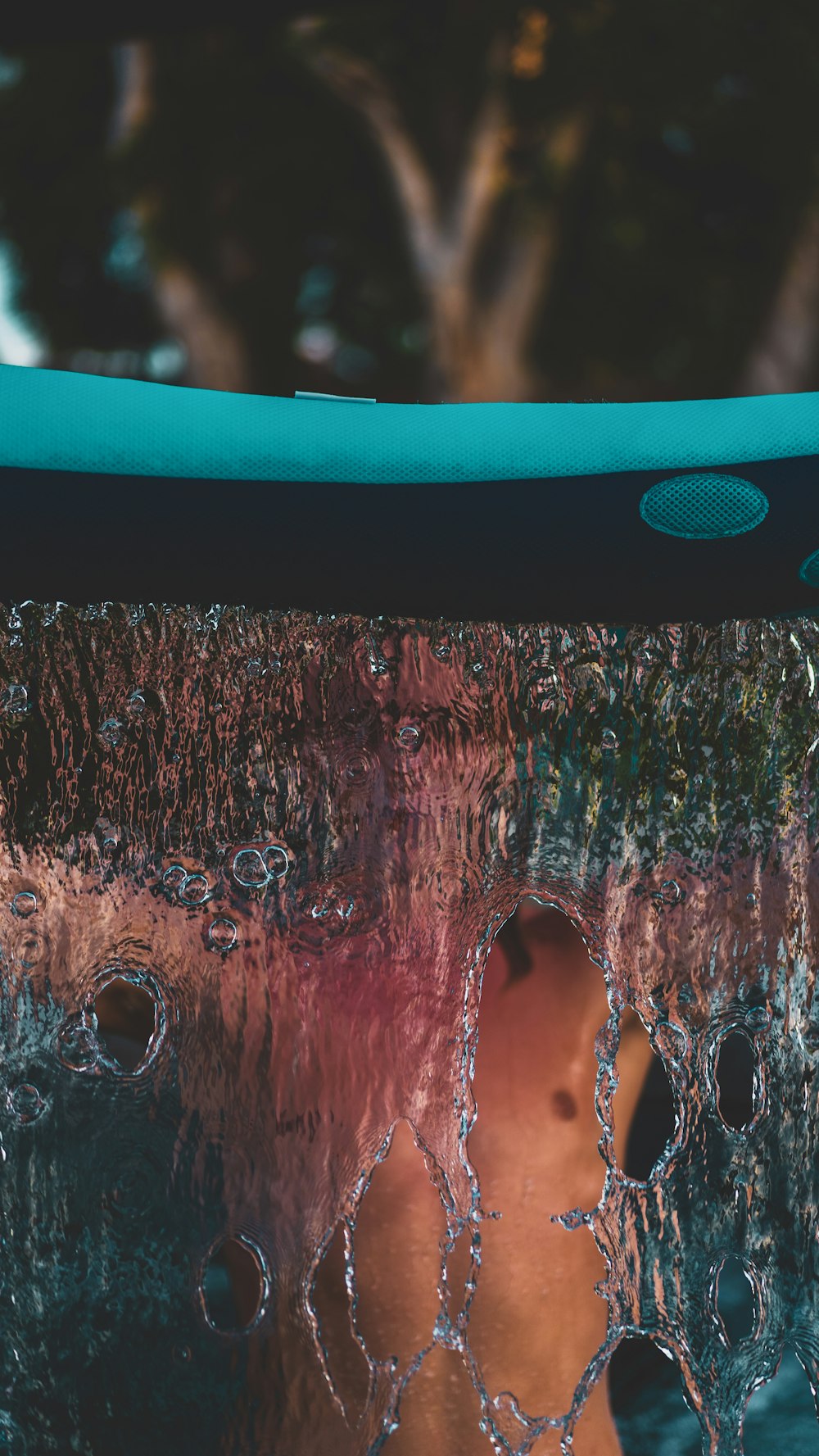 a close up of a surfboard in the water