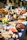 A spread of Brasaviva's catered barbecue dishes laid out on a picnic table at an outdoor event.
