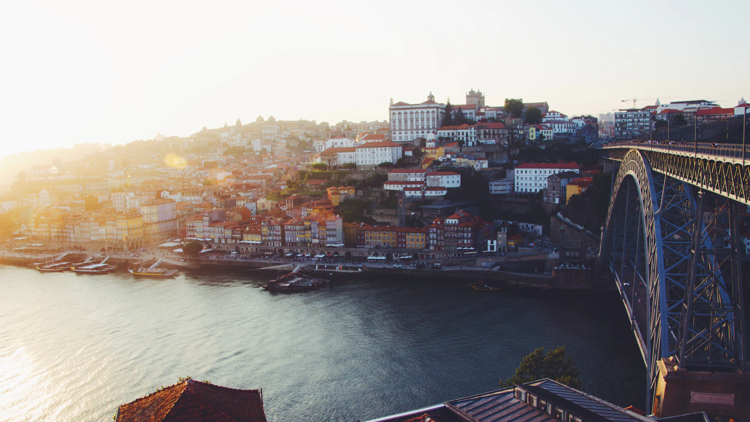 Porto’s riverside hills seen across the Douro at sunset